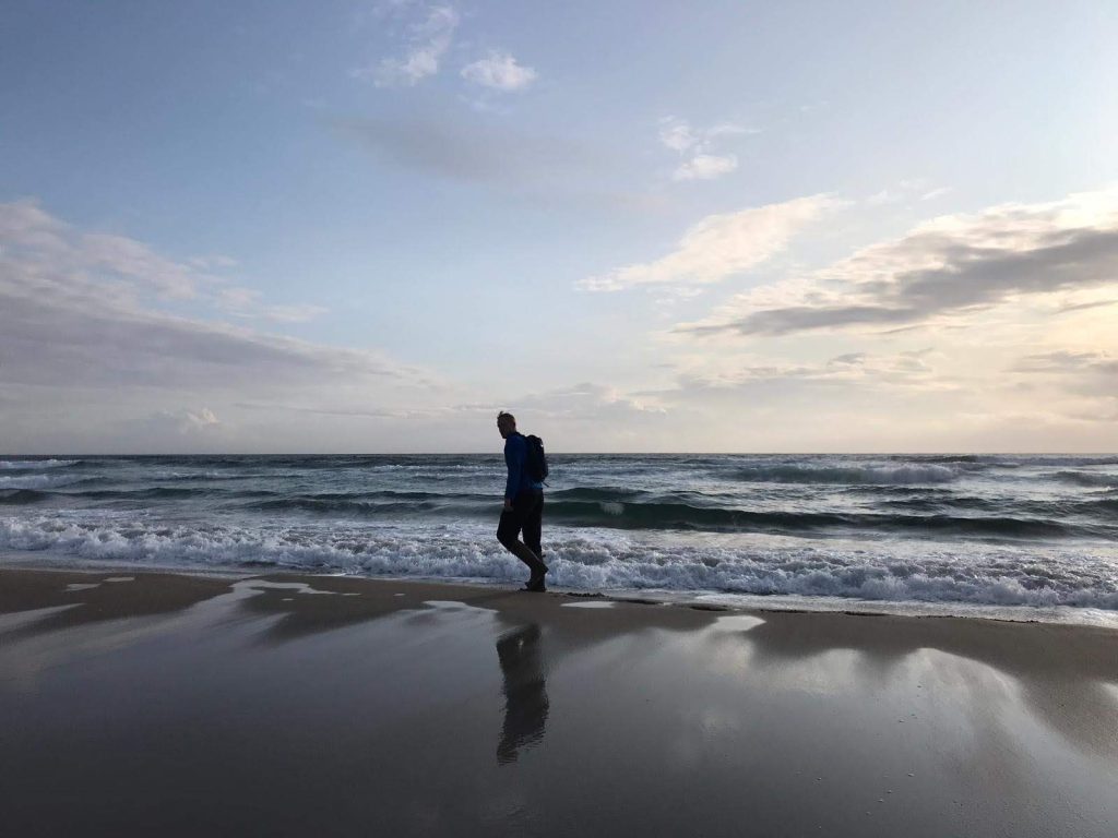 Man paddling in the sea