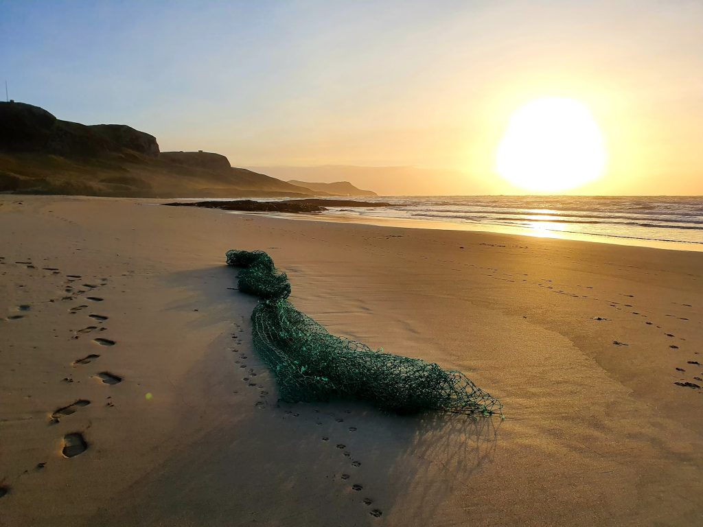 Net on sandy beach