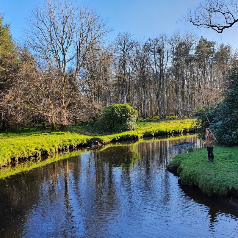 Person by river