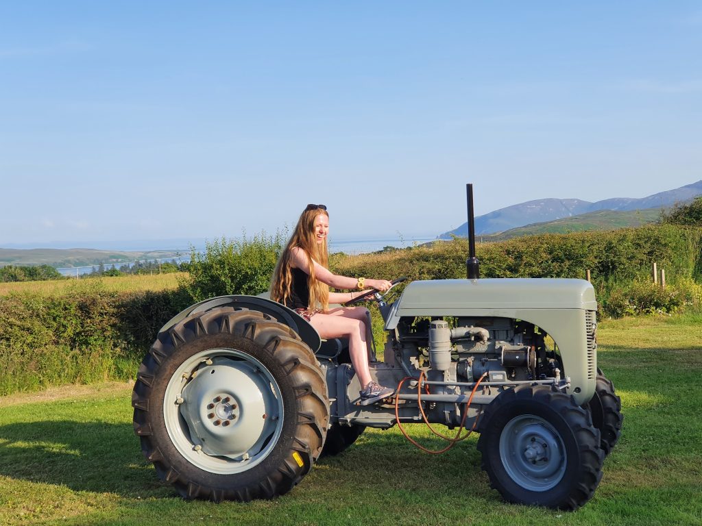 girl on tractor