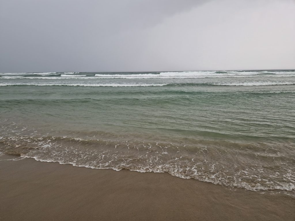 waves breaking on shore