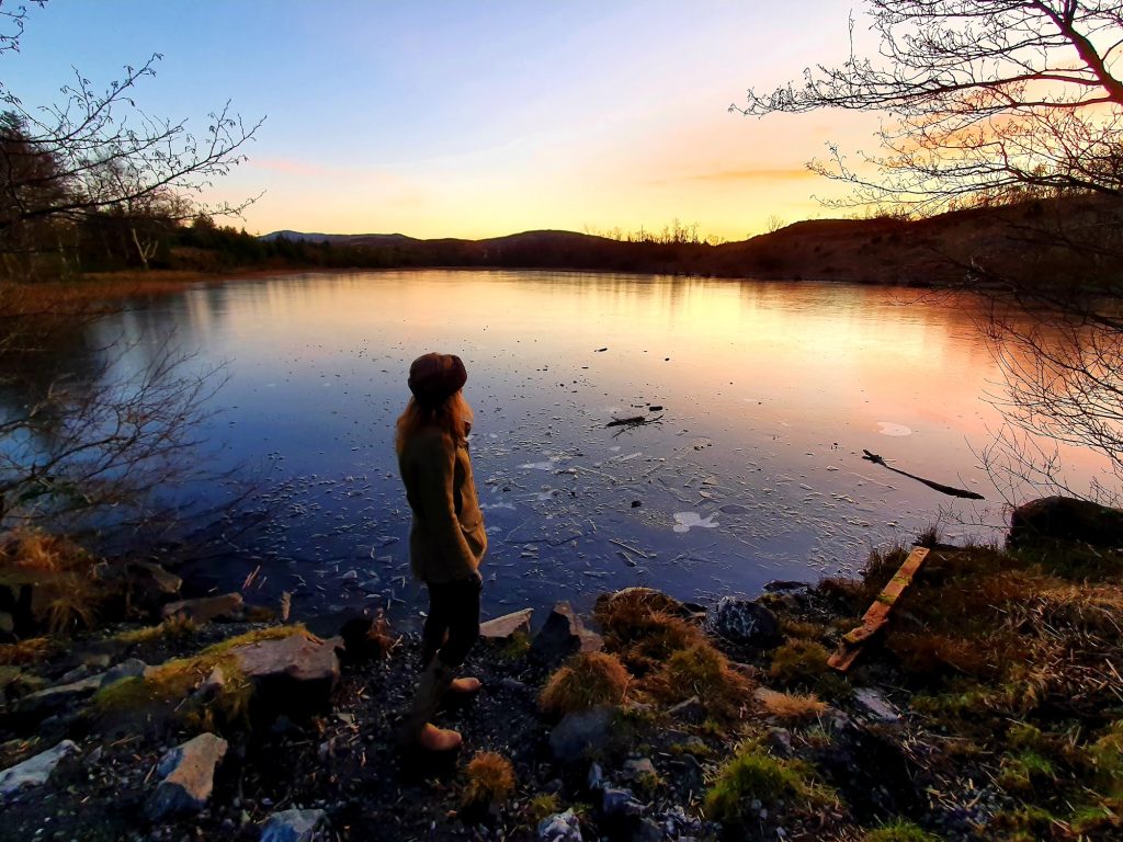 Lady beside loch