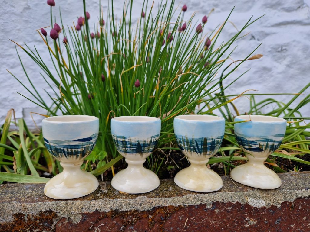 Four egg cups